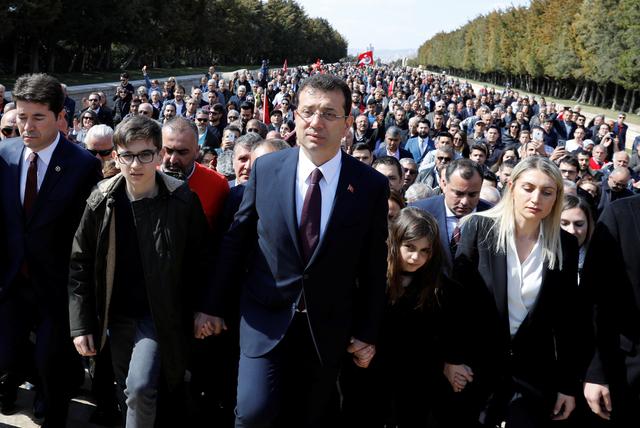Ekrem Imamoglu, main opposition Republican People's Party (CHP) candidate for mayor of Istanbul, visits Anitkabir, the mausoleum of modern Turkey's founder Mustafa Kemal Ataturk, as he is flanked by his family members and supporters in Ankara, Turkey, April 2, 2019. REUTERS/Umit Bektas
