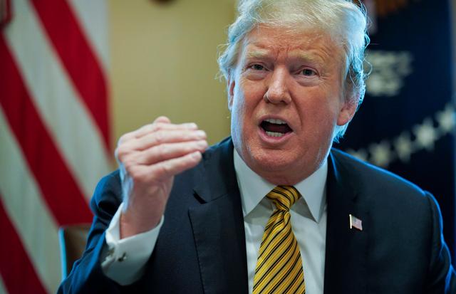 FILE PHOTO - U.S. President Donald Trump speaks during a meeting of the White House Opportunity and Revitalization Council in the Cabinet room at the White House in Washington, U.S., April 4, 2019. REUTERS/Kevin Lamarque