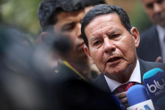 FILE PHOTO: Brazilian Vice President Hamilton Mourao speaks to the media after a meeting of the Lima Group in Bogota, Colombia, February 25, 2019. REUTERS/Luisa Gonzalez/File Photo