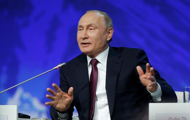 Russian President Vladimir Putin speaks during a session of the International Arctic Forum in Saint Petersburg, Russia April 9, 2019. REUTERS/Anton Vaganov
