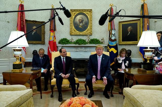 FILE PHOTO: U.S. President Donald Trump meets with Egypt's President Abdel Fattah Al Sisi in the Oval Office at the White House in Washington, U.S., April 9, 2019. REUTERS/Kevin Lamarque/File Photo