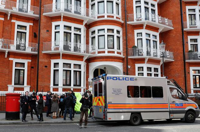 A police van is seen outside the Ecuadorian embassy after WikiLeaks founder Julian Assange was arrested by British police in London, Britain, April 11, 2019. REUTERS/Peter Nicholls
