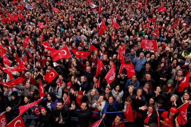 FILE PHOTO: Supporters of main opposition Republican People's Party (CHP) wave flags as they listen to mayoral candidate Ekrem Imamoglu during a gathering in Istanbul, Turkey, April 12, 2019. REUTERS/Murad Sezer