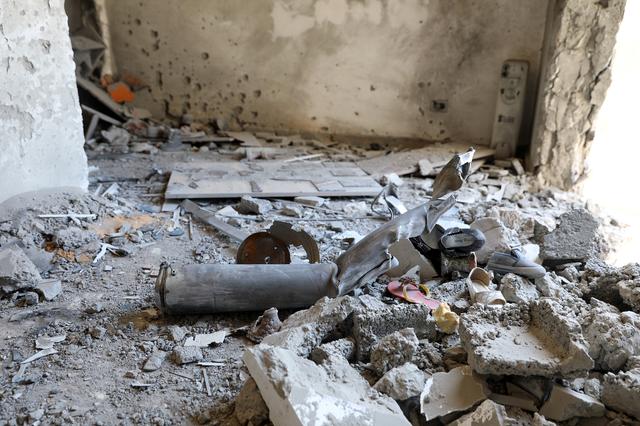 The inside of a house damaged by shelling during the fighting between the eastern forces and internationally recognized government is pictured in Abu Salim in Tripoli, Libya April 15, 2019. REUTERS/Hani Amara