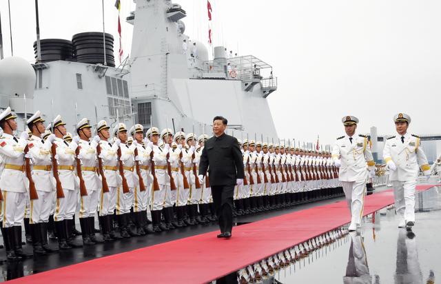Chinese President Xi Jinping reviews the honor guards of the Chinese People’s Liberation (PLA) Navy before boarding the destroyer Xining for the naval parade celebrating the 70th founding anniversary of the Chinese People's Liberation Army (PLA) Navy in Qingdao, Shandong province, China April 23, 2019. Xinhua via REUTERS 