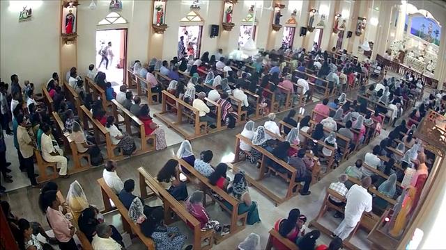 A suspected suicide bomber enters St. Sebastian's Church in Negombo, Sri Lanka April 21, 2019 in this still image taken from a CCTV handout footage of Easter Sunday attacks released on April 23, 2019. CCTV/Siyatha News via REUTERS 