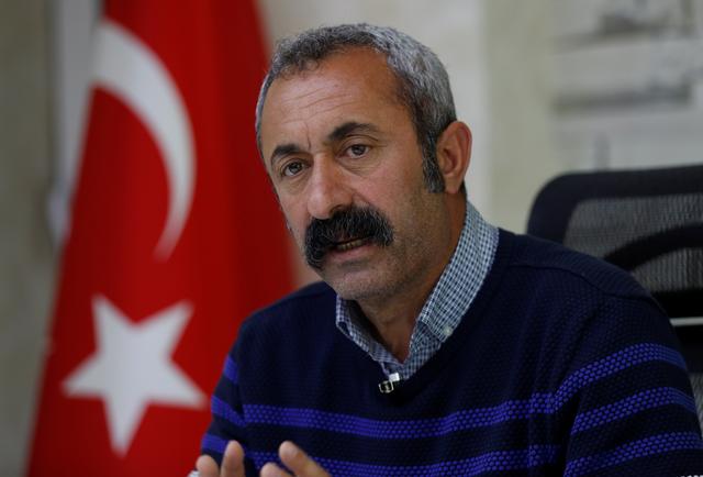 Tunceli Mayor Fatih Mehmet Macoglu from the Communist Party of Turkey (TKP) speaks during an interview at his office in Tunceli, Turkey April 15, 2019. REUTERS/Murad Sezer