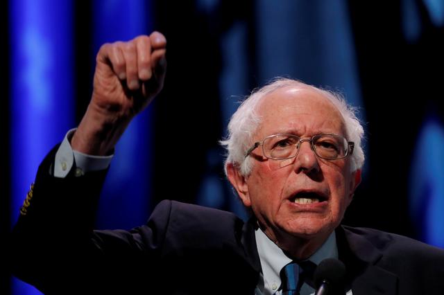 FILE PHOTO: U.S. 2020 Democratic presidential candidate and Senator Bernie Sanders participates in a moderated discussion at the We the People Summit in Washington, U.S., April 1, 2019. REUTERS/Carlos Barria/File Photo