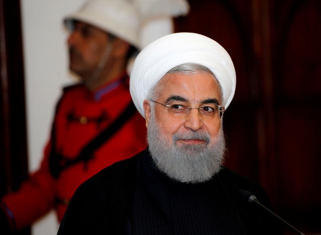 FILE PHOTO: Iranian President Hassan Rouhani speaks during a news conference with Iraqi President Barham Salih (not pictured) in Baghdad, Iraq, March 11, 2019. REUTERS/Thaier al-Sudani