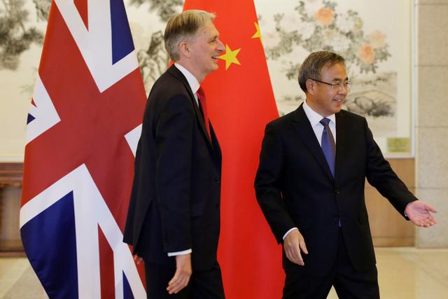 Britain's Chancellor of the Exchequer Philip Hammond meets Chinese Vice Premier Hu Chunhua at Diaoyutai State Guesthouse in Beijing, China, April 25, 2019. REUTERS/Jason Lee/Pool