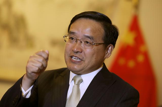 FILE PHOTO: Jia Guide, China's ambassador to Peru, speaks during an interview with Reuters at the Chinese embassy in Lima, Peru April 11, 2018. REUTERS/Mariana Bazo