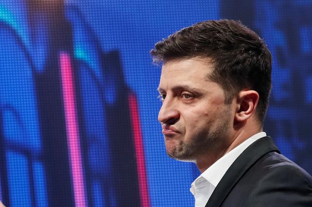 FILE PHOTO: Volodymyr Zelenskiy, Ukrainian comedian and candidate in the upcoming presidential election, hosts a comedy show at a concert hall in Brovary, Ukraine March 29, 2019. REUTERS/Valentyn Ogirenko/File Photo