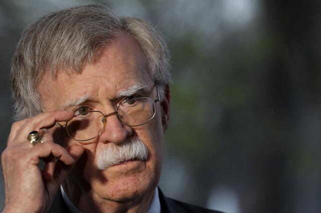 FILE PHOTO: U.S. national security adviser John Bolton speaks during an interview at the White House in Washington, U.S., March 29, 2019. REUTERS/Brendan McDermid/File Photo