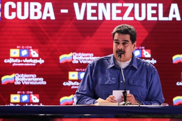 FILE PHOTO: Venezuela's President Nicolas Maduro attends an event regarding the Cuba-Venezuela Comprehensive Agreement in Caracas, Venezuela October 31, 2018. Miraflores Palace/Handout via REUTERS