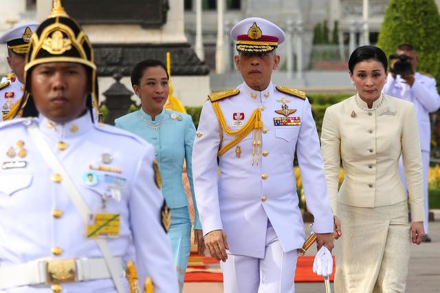 Thailand's King Maha Vajiralongkorn, Queen Suthida and Princess Bajrakitiyabha leave after paying their respect at the statue of King Rama V at the Royal Plaza in Bangkok, Thailand, May 2, 2019. Pool via Reuters