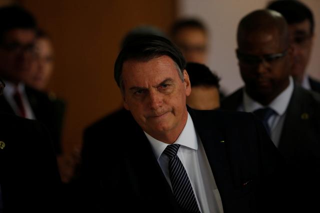 FILE PHOTO: Brazil's President Jair Bolsonaro attends a ceremony at the Planalto Palace in Brasilia, Brazil  April 25, 2019. REUTERS/Adriano Machado