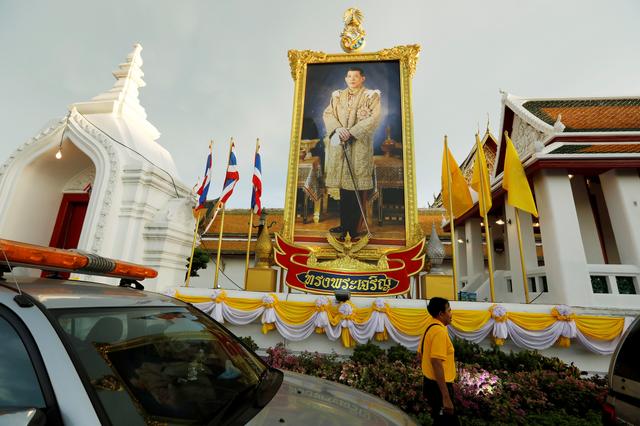 A portrait of King Maha Vajiralongkorn is seen outside Wat Suthat temple on the eve of his coronation in Bangkok, Thailand May 3, 2019. REUTERS/Jorge Silva
