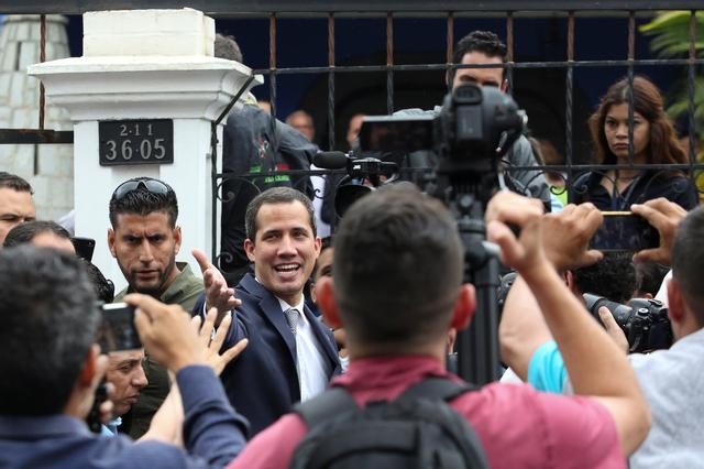 Venezuelan opposition leader Juan Guaido, who many nations have recognised as the country's rightful interim ruler, leaves after a news conference in Caracas, Venezuela, May 3, 2019. REUTERS/Carlos Eduardo Ramirez