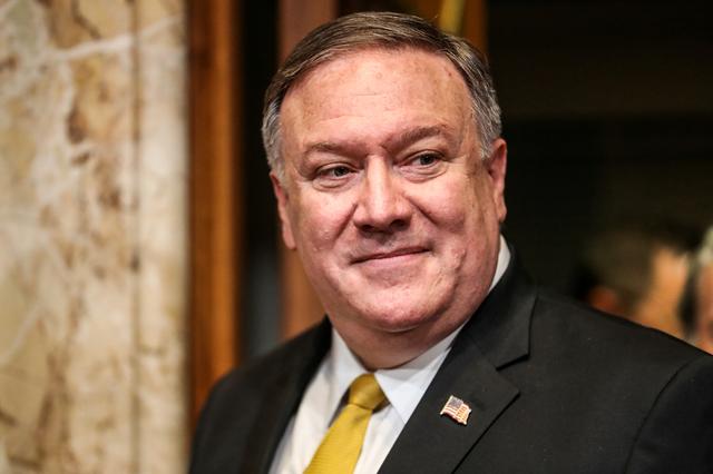FILE PHOTO: U.S. Secretary of State Mike Pompeo arrives before a Senate Appropriations Subcommittee hearing on the proposed budget estimates and justification for FY2020 for the State Department on Capitol Hill in Washington, U.S., April 9, 2019. REUTERS/Jeenah Moon/File Photo