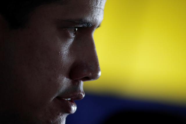 Venezuelan opposition leader Juan Guaido, who many nations have recognised as the country's rightful interim ruler, looks on during a news conference in Caracas, Venezuela May 9, 2019. REUTERS/Ueslei Marcelino