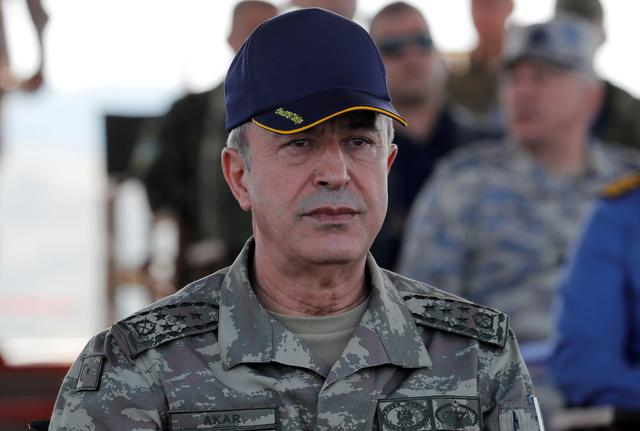 FILE PHOTO: Turkey's Hulusi Akar, when he was chief of the general staff, during the EFES-2018 military exercise near the Aegean port city of Izmir, Turkey May 10, 2018. REUTERS/Osman Orsal/File Photo