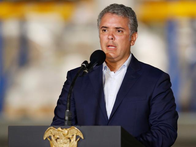 Colombia’s President Ivan Duque speaks at a news conference during a visit by U.S. Secretary of State at a warehouse where international humanitarian aid for Venezuela is being stored, near La Unidad cross-border bridge between Colombia and Venezuela in Cucuta, Colombia April 14, 2019. REUTERS/Luisa Gonzalez 