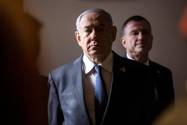 FILE PHOTO: Israeli Prime Minister Benjamin Netanyahu arrives to a ceremony on Memorial Day, when Israel commemorates its fallen soldiers, at Mount Herzl in Jerusalem May 8, 2019. Heidi Levine/Pool via REUTERS/File Photo