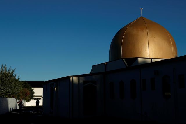 FILE PHOTO: Armed police officers stand guard outside Al Noor mosque where more than 40 people were killed by a suspected white supremacist during Friday prayers on March 15, in Christchurch, New Zealand April 1, 2019. REUTERS/Edgar Su 