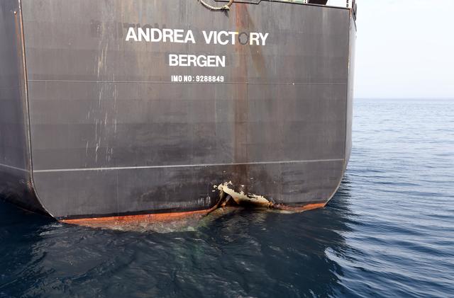FILE PHOTO: A damaged Andrea Victory ship is seen off the Port of Fujairah, United Arab Emirates, May 13, 2019. REUTERS/Satish Kumar