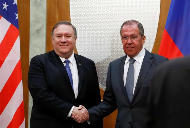 U.S. Secretary of State Mike Pompeo and Russian Foreign Minister Sergey Lavrov shake hands as they pose for a photo prior to their talks in the Black Sea resort city of Sochi, Russia, May 14, 2019. Pavel Golovkin/Pool via REUTERS