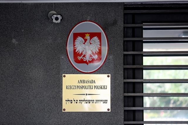 FILE PHOTO: Signage is seen at the entrance of the Polish Embassy in Tel Aviv, Israel May 15, 2019. REUTERS/Corinna Kern/File Photo
