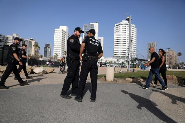 Israeli policemen patrol the area near the beach on the eve of the 2019 Eurovision song contest final in Tel Aviv, Israel May 18, 2019 REUTERS/ Ammar Awad