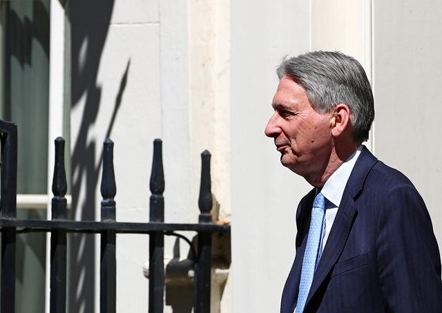 Britain's Chancellor of the Exchequer Philip Hammond is seen outside Downing Street, as uncertainty over Brexit continues, in London, Britain May 21, 2019. REUTERS/Hannah Mckay