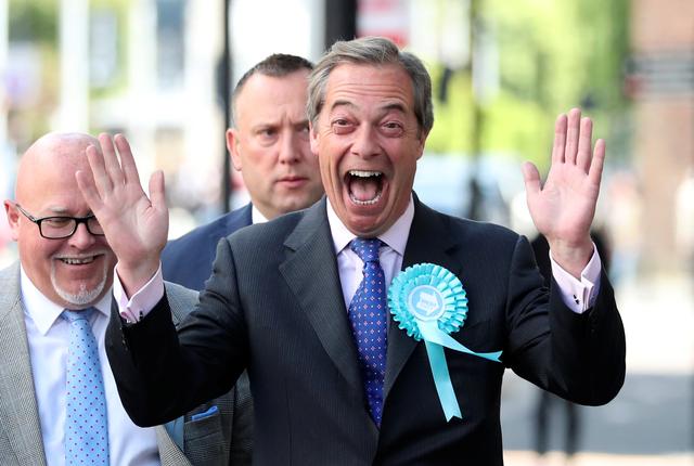 Brexit Party leader Nigel Farage gestures as he arrives to attend a Brexit Party campaign event in Newcastle, Britain, May 20, 2019. REUTERS/Scott Heppell