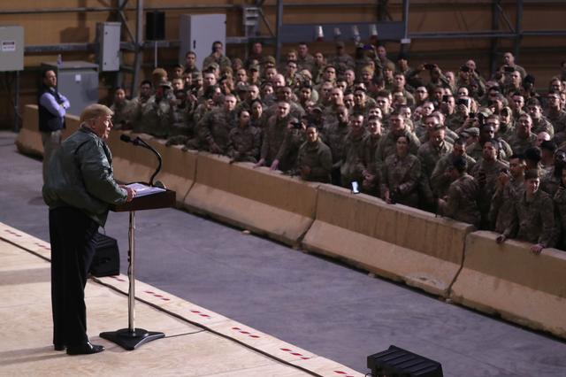 FILE PHOTO: U.S. President Donald Trump delivers remarks to U.S. troops in an unannounced visit to Al Asad Air Base, Iraq December 26, 2018. REUTERS/Jonathan Ernst