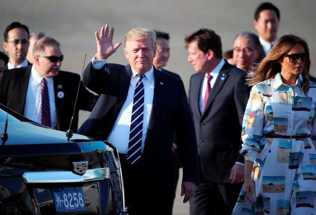 U.S. President Donald Trump waves as he arrives at the Haneda International Airport in Tokyo, Japan, May 25, 2019. Koji Sasahara/Pool via Reuters