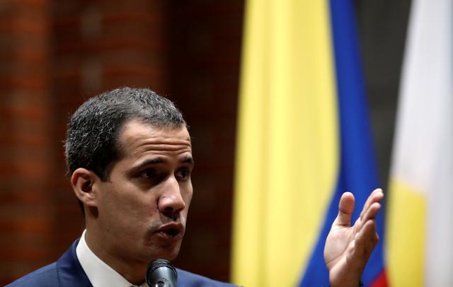 FILE PHOTO: Venezuelan opposition leader Juan Guaido, who many nations have recognised as the country's rightful interim ruler, speaks at a meeting at the Andres Bello Catholic University in Caracas, Venezuela May 24, 2019. REUTERS/Manaure Quintero