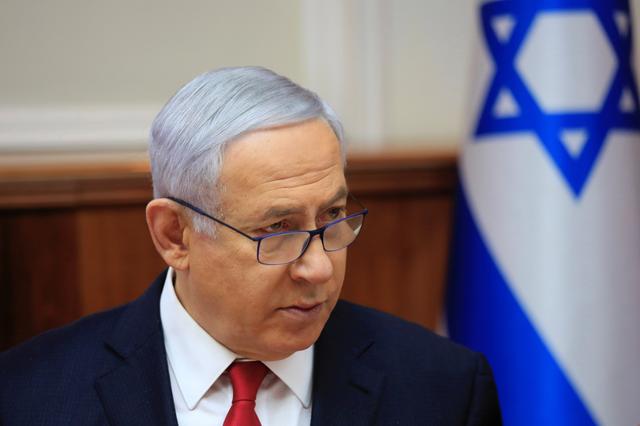 FILE PHOTO: Israeli Prime Minister Benjamin Netanyahu speaks during the weekly cabinet meeting at the Prime Minister's office in Jerusalem May 19, 2019. Ariel Schalit/Pool via REUTERS