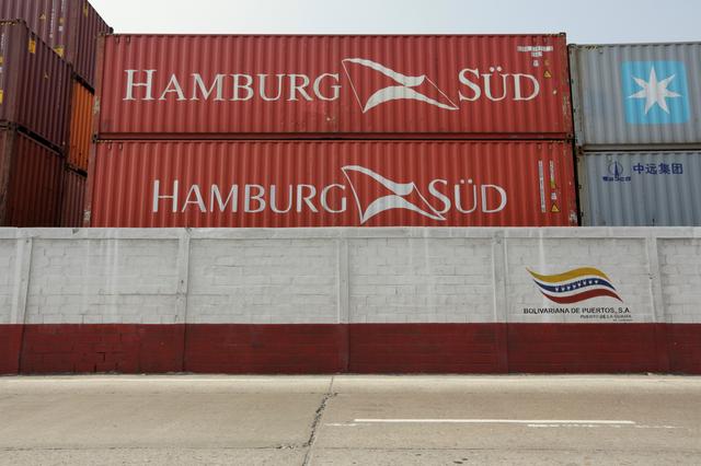 FILE PHOTO - Containers from Hamburg Sud Shipping Company are seen at La Guaira port, in La Guaira, Venezuela March 31, 2016. REUTERS/Marco Bello