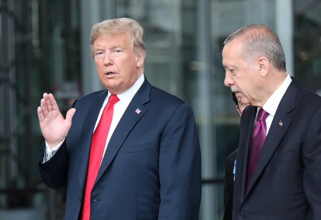 FILE PHOTO: U.S. President Donald Trump talks to Turkey's President Recep Tayyip Erdogan at NATO headquarters in Brussels, Belgium July 11, 2018.Tatyana Zenkovich/Pool via REUTERS