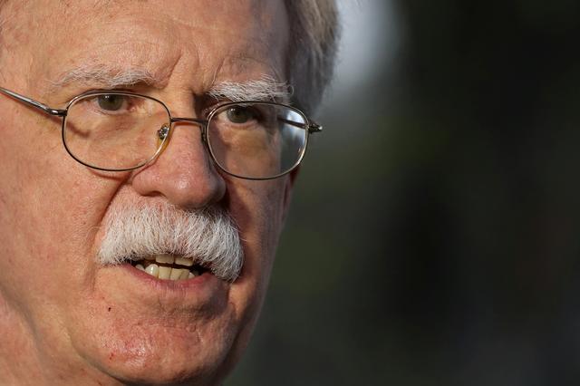 FILE PHOTO: U.S. National Security Advisor John Bolton speaks during an interview at the White House in Washington, U.S., March 29, 2019. REUTERS/Brendan McDermid/File Photo