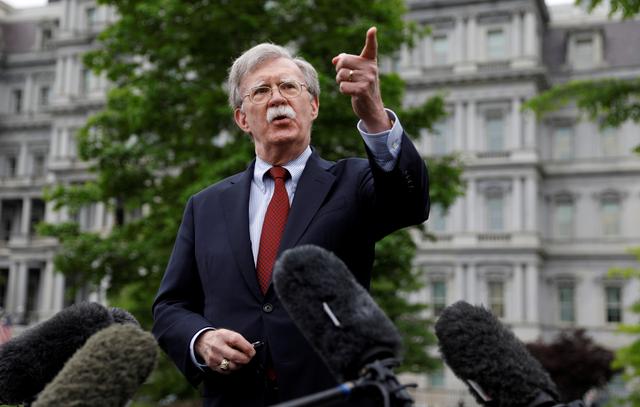 FILE PHOTO: U.S. national security adviser John Bolton talks to reporters at the White House in Washington, U.S., May 1, 2019.  REUTERS/Kevin Lamarque/File Photo