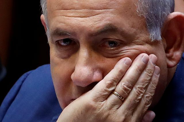 Israeli Prime Minister Benjamin Netanyahu sits at the plenum at the Knesset, Israel's parliament, in Jerusalem May 30, 2019. REUTERS/Ronen Zvulun
