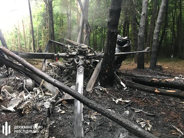 A view shows the crash site of a military helicopter Mi-8 in Rivne Region, Ukraine in this handout photo released by State Bureau of Investigation May 30, 2019. Ukraine's State Bureau of Investigation/Handout via REUTERS 