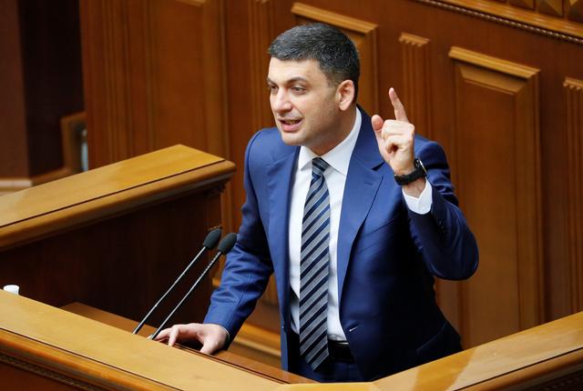 Ukraine's Prime Minister Volodymyr Groysman delivers a speech during a session of parliament in Kiev, Ukraine May 30, 2019. REUTERS/Valentyn Ogirenko