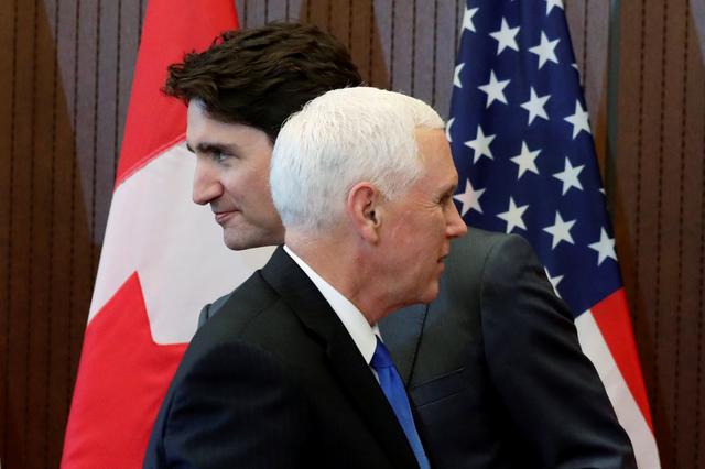 Canada's Prime Minister Justin Trudeau and U.S. Vice President Mike Pence take part in a welcoming ceremony on Parliament Hill in Ottawa, Ontario, Canada, May 30, 2019. REUTERS/Chris Wattie