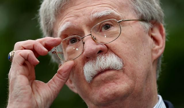 FILE PHOTO: U.S. national security adviser John Bolton speaks to reporters at the White House in Washington, U.S., May 1, 2019.  REUTERS/Kevin Lamarque/File Photo