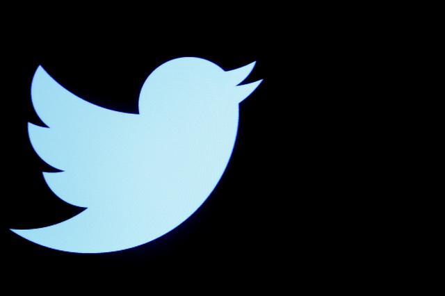 FILE PHOTO: The Twitter logo is displayed on a screen on the floor of the New York Stock Exchange (NYSE) in New York City, U.S., September 28, 2016. REUTERS/Brendan McDermid/File Photo
