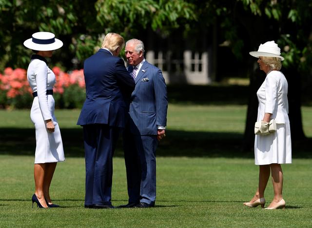 U.S. President Donald Trump and First Lady Melania Trump meet Britain's Prince Charles and Camilla, Duchess of Cornwall, as they arrive at Buckingham Palace, in London, Britain, June 3, 2019. REUTERS/Toby Melville/Pool