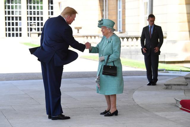Britain's Queen Elizabeth II greets U.S. President Donald Trump as he arrives for the Ceremonial Welcome at Buckingham Palace, in London, Britain June 3, 2019. Victoria Jones/Pool via REUTERS